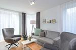 Wohn-Essbereich mit Couch - Apartmentvilla Anna See 1-10 - Top-Hundeurlaub