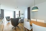 Wohnbereich mit Couch und Sessel - Apartmentvilla Anna See 1-10 - Top-Hundeurlaub