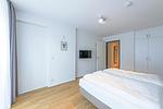 Schlafzimmer mit Kleiderschrank - Apartmentvilla Anna See 1-10 - Top-Hundeurlaub