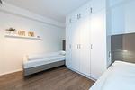 Schlafzimmer mit Einzelbetten und Kleiderschrank - Apartmentvilla Anna See 1-13 - Top-Hundeurlaub