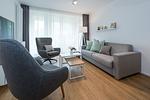 Wohn-Essbereich mit Couch - Apartmentvilla Anna See 1-15 - Top-Hundeurlaub