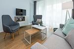 Wohn-Essbereich mit Couch - Apartmentvilla Anna See 1-15 - Top-Hundeurlaub