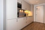 Küchenzeile mit Mikrowelle - Apartmentvilla Anna See 1-16 - Top-Hundeurlaub