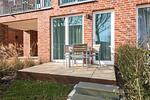 Terrasse mit Tisch und Sitzgelegenheiten - Apartmentvilla Anna See 1-18 - Top-Hundeurlaub