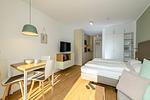 Wohn-Schlafbereich mit Sitzgelegenheit - Apartmentvilla Anna See 2-06 - Top-Hundeurlaub