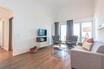 Wohnbereich mit TV - Apartmentvilla Anna See 3-13 - Top-Hundeurlaub