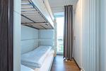 Schlafzimmer mit Etagenbett - Apartmentvilla Anna See 3-13 - Top-Hundeurlaub
