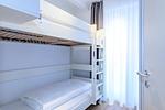 Schlafzimmer mit Stapelbett - Deichhäuser Anna Küste 1-10 - Top-Hundeurlaub