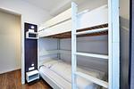 Schlafzimmer mit Etagenbett - Deichhäuser Anna Küste 3-20 - Top-Hundeurlaub