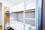 Schlafzimmer mit Etagenbett - Deichhäuser Anna Küste 3-30 - Top-Hundeurlaub