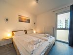 Schlafzimmer mit Doppelbett - NordseeResort Friesland 51-1-M - Top-Hundeurlaub