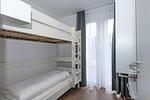 Schlafzimmer mit Etagenbett und Kleiderschrank - Deichhäuser Anna Küste 6-10 - Top-Hundeurlaub