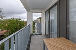 Überdachter Balkon mit Sitzgelegenheit - Deichhäuser Anna Küste 6-31 - Top-Hundeurlaub