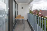 Überdachter Balkon mit Sitzgelegenheit - Deichhäuser Anna Küste 6-31 - Top-Hundeurlaub