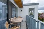 Überdachter Balkon mit Sitzgelegenheit - Deichhäuser Anna Küste 6-31 - Top-Hundeurlaub