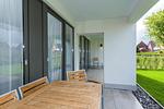 Überdachte Terrasse mit Sitzgelegenheit - Deichhäuser Anna Küste 7-13 - Top-Hundeurlaub