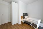 Schlafzimmer mit zwei Einzelbetten - Deichhäuser Anna Küste 7-34 - Top-Hundeurlaub