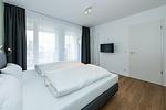 Schlafzimmer mit Doppelbett - Deichhäuser Anna Küste 8-14 - Top-Hundeurlaub