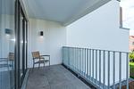 Überdachter Balkon mit Sitzgelegenheit - Deichhäuser Anna Küste 8-23 - Top-Hundeurlaub