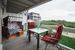 Balkon mit Gartenmöbeln - Resort Deichgraf 27-07 - Top-Hundeurlaub