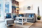 Wohn-/Essbereich mit Doppelschlafcouch - Apartmentanlage Meerblickvilla 1-06 - Top-Hundeurlaub