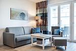 Wohn-/Essbereich mit Doppelschlafcouch - Apartmentanlage Meerblickvilla 1-14 - Top-Hundeurlaub