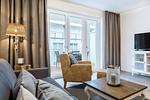 Wohn-/Essbereich mit Zugang zum Balkon - Apartmentanlage Meerblickvilla 1-15 - Top-Hundeurlaub
