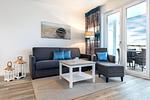 Wohn-/Essbereich mit Doppelschlafcouch - Apartmentanlage Meerblickvilla 2-18 - Top-Hundeurlaub