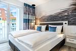 Schlafzimmer mit Austritt - Apartmentanlage Meerblickvilla 2-18 - Top-Hundeurlaub