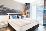 Schlafzimmer 2 mit Boxspringbett - Apartmentanlage Meerblickvilla 2-25 - Top-Hundeurlaub