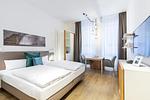 Wohn-/Schlafbereich mit Boxspringbett - Ferienapartments am Krusespeicher 0-04 - Top-Hundeurlaub