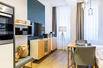 Wohn-/Schlafbereich mit Flatscreen-TV - Ferienapartments am Krusespeicher 2-23 - Top-Hundeurlaub