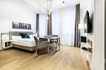 Wohn-/Schlafbereich mit Boxspringbett - Ferienapartments am Krusespeicher 0-01 - Top-Hundeurlaub