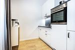 Küche mit Küchenzeile - Ferienapartments am Krusespeicher 0-01 - Top-Hundeurlaub