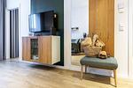 Wohn-/Essbereich mit Flatscreen-TV - Ferienapartments am Krusespeicher 2-20 - Top-Hundeurlaub