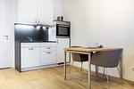 Wohn-/Essbereich mit Esstisch - Ferienapartments am Krusespeicher 2-20 - Top-Hundeurlaub