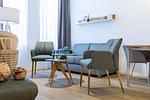 Wohn-/Essbereich mit Einzelschlafcouch - Ferienapartments am Krusespeicher 2-15 - Top-Hundeurlaub