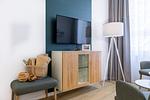 Wohn-/Essbereich mit Flatscrren-TV - Ferienapartments am Krusespeicher 2-15 - Top-Hundeurlaub