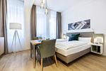 Wohn-/Schlafbereich mit Sitzgelegenheit - Ferienapartments am Krusespeicher 2-21 - Top-Hundeurlaub