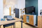 Wohn-/Schlafbereich mit Sitzgelegenheit - Ferienapartments am Krusespeicher 2-21 - Top-Hundeurlaub