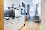 Wohn-/Schlafbereich mit Sitzgelegenheit - Ferienapartments am Krusespeicher 2-21 - Top-Hundeurlaub