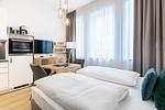 Wohn-/Schlafbereich mit Flatscreen-TV - Ferienapartments am Krusespeicher 3-26 - Top-Hundeurlaub