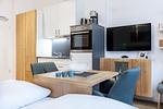 Wohn-/Schlafbereich mit Sitzgelegenheit - Ferienapartments am Krusespeicher 3-26 - Top-Hundeurlaub
