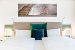 Wohn-/Schlafbereich mit Boxspringbett - Ferienapartments am Krusespeicher 3-29 - Top-Hundeurlaub