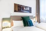 Schlafzimmer mit Boxspringbett - Ferienapartments am Krusespeicher 3-30 - Top-Hundeurlaub