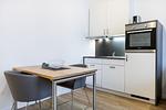 Wohn-/Essbereich mit Esstisch - Ferienapartments am Krusespeicher 3-35 - Top-Hundeurlaub