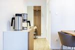 Wohn-/Essbereich mit Esstisch - Ferienapartments am Krusespeicher 3-35 - Top-Hundeurlaub