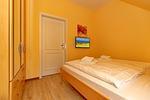 Schlafzimmer mit Doppelbett - Dünenschloss 2-25 - Top-Hundeurlaub