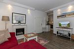 Wohn-Essbereich mit Couch und Flatscreen-TV - Dünenschloss 3-05 - Top-Hundeurlaub