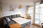 Wohn-Essbereich mit Schlaf-Couch im kbat318, Apartmenthaus Atlantik 318 in Kühlungsborn - Apartmenthaus Atlantik 318 - Top-Hundeurlaub